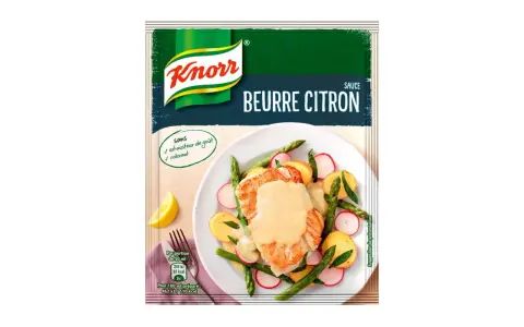 Une assiette de poisson avec des légumes, nappée d'une sauce beurre citron Knorr. Sans exhausteur de goût ni colorant.