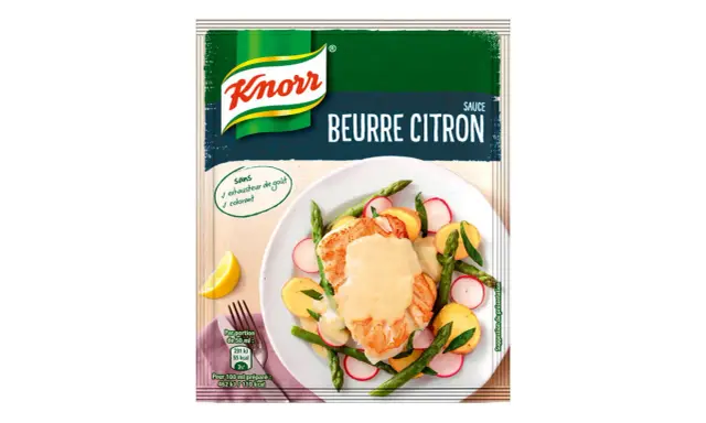 Une assiette de poisson avec des légumes, nappée d'une sauce beurre citron Knorr. Sans exhausteur de goût ni colorant.